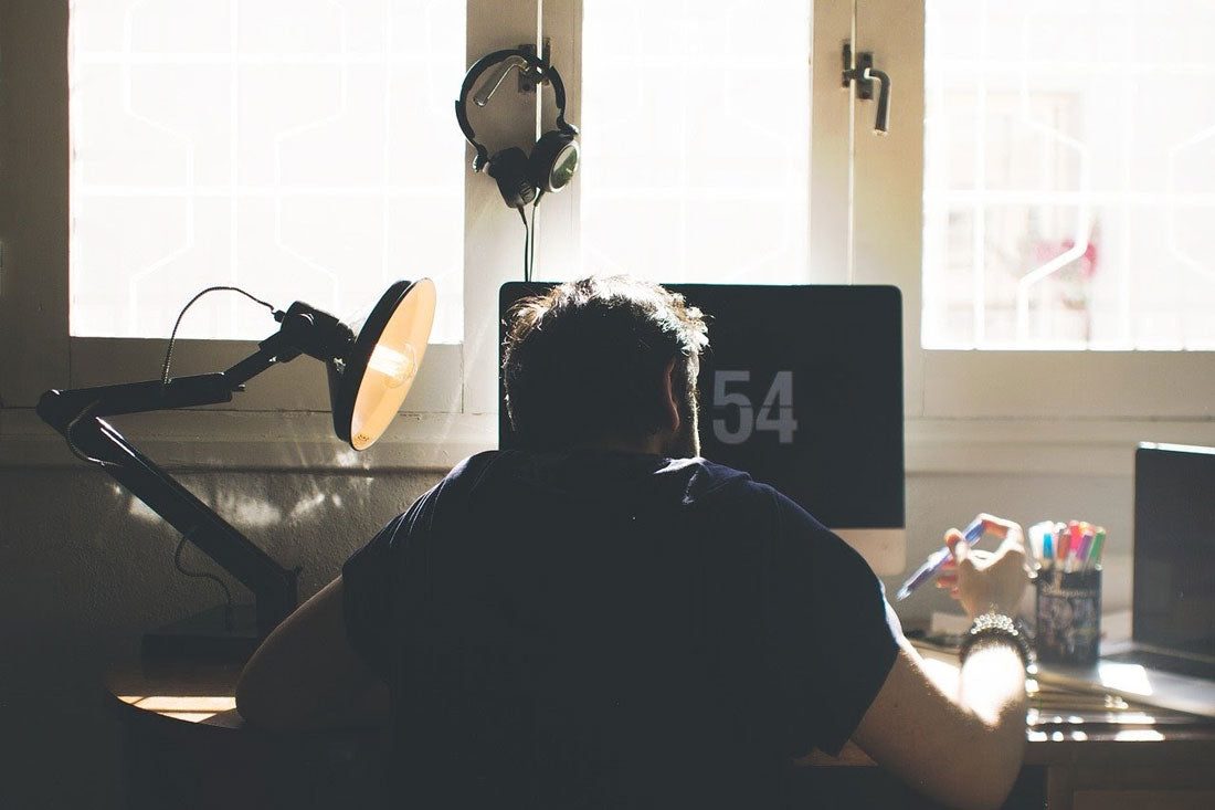 man at his work from home setup