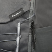 Gray backpack with Targus branding on a close-up of the zipper and fabric texture.