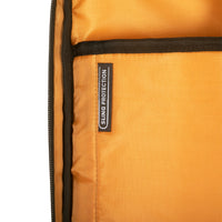 Close-up of an orange bag with a 'Sling Protection' label on a white background