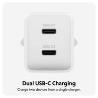 A white dual USB-C charger with two USB-C ports labeled USB-C1 and USB-C2, shown on a light gray background with the text 'Dual USB-C Charging' and 'Charge two devices from a single charger.'.