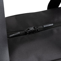 Close-up of a black nylon bag with a black zipper and a silver-toned metal pull tab labeled 'Furmin'.