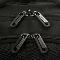 Close-up of a black bag with zipper pulls and 'TARGUS' branding.