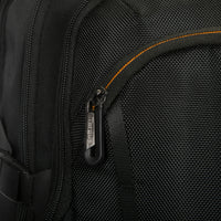 Close-up of a black backpack with a zipper and brand logo.