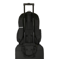 black targus backpack with trolley strap on a suitcase