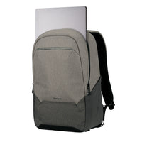 A gray and black backpack with a silver laptop partially inserted into the top pocket, shown against a plain white background.
