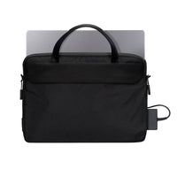 Targus laptop briefcase black on white background back showing pockets