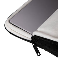 Close-up of a laptop sleeve with a zipper on a white background