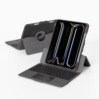 A dark gray rugged tablet case with an attached keyboard cover, shown in two views on a light gray background. The front view shows the case open with a tablet inside and a kickstand, while the rear view shows the back of the case with a built-in keyboard and circular rotation ring.